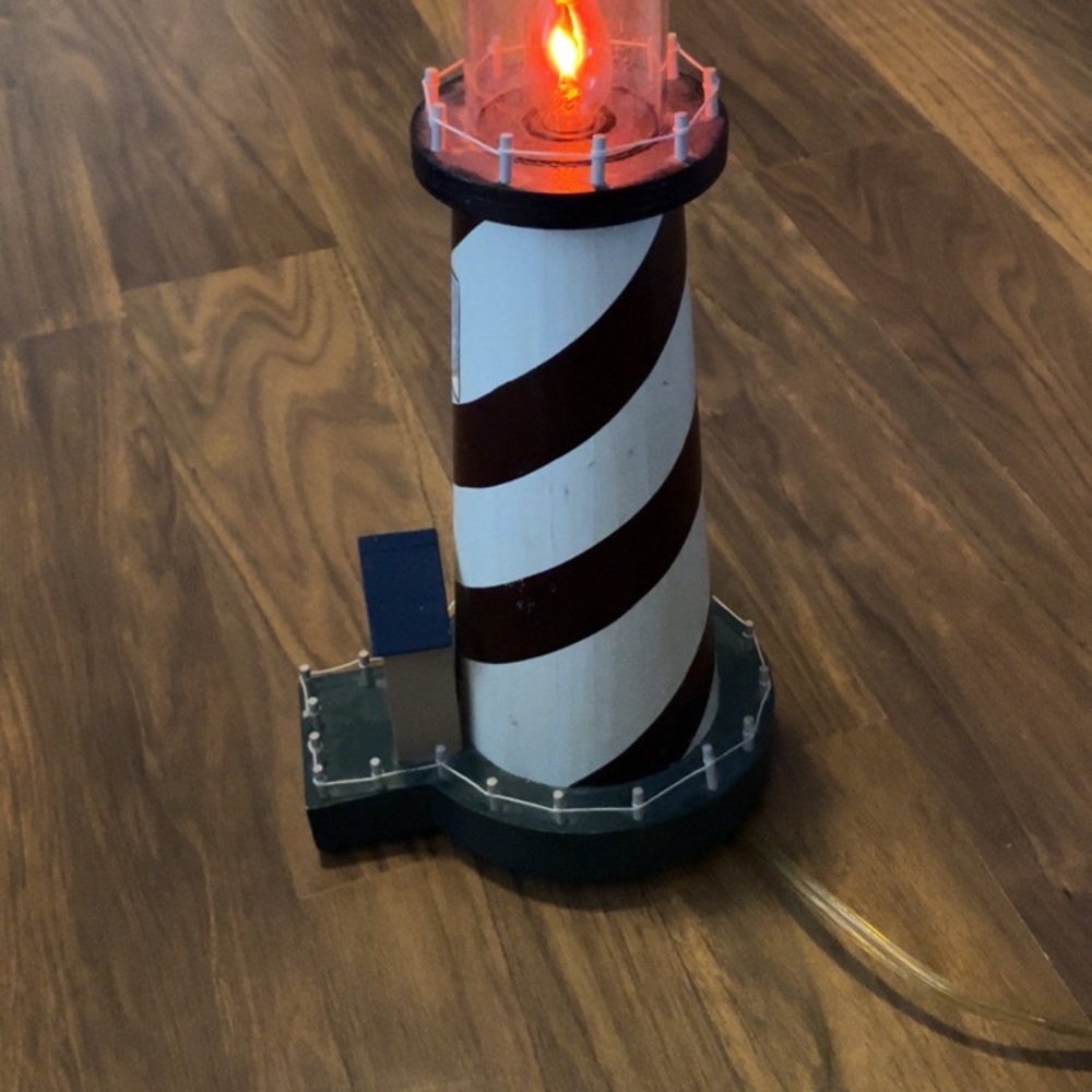 Hand Crafted Lighthouse Decor with Red and White Stripes